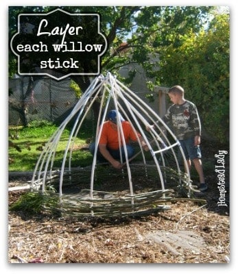 DIY Willow Playhouse l Layer each stick of willow l Homestead Lady (.com)