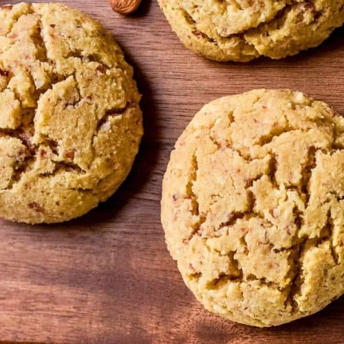 round solar oven scones made with almond flour sitting on a board