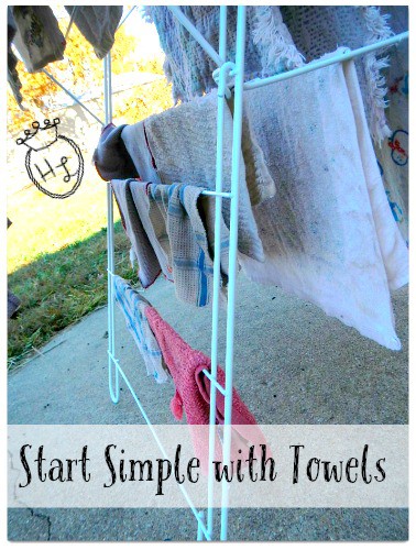 Clothes Drying Rack with towels on it drying
