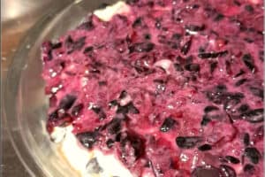 grape coffee cake batter in a pan