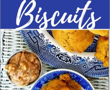 pumpkin biscuits sitting on a blue and white plate