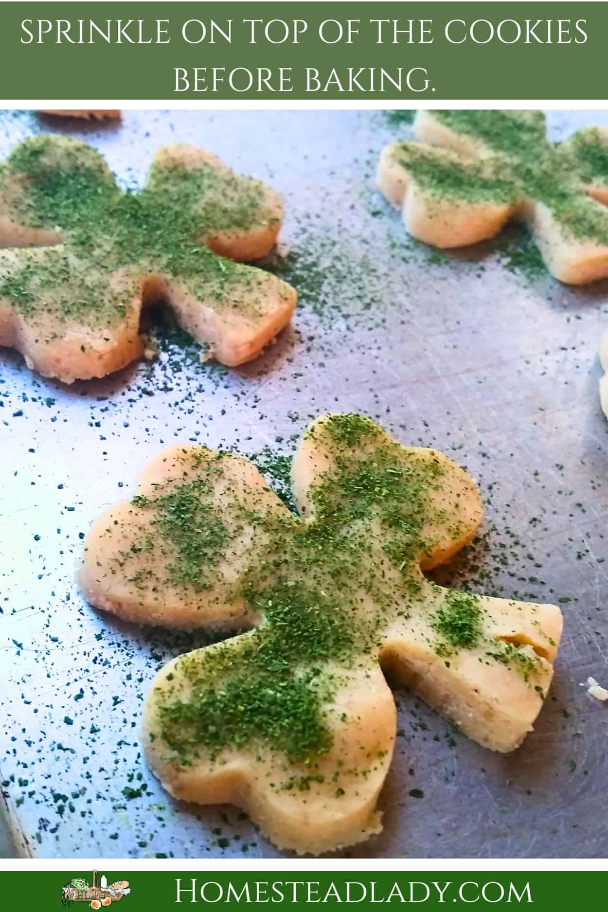 shamrock shaped naturally dyed cookies on a table