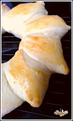 sun shaped bread on black pan