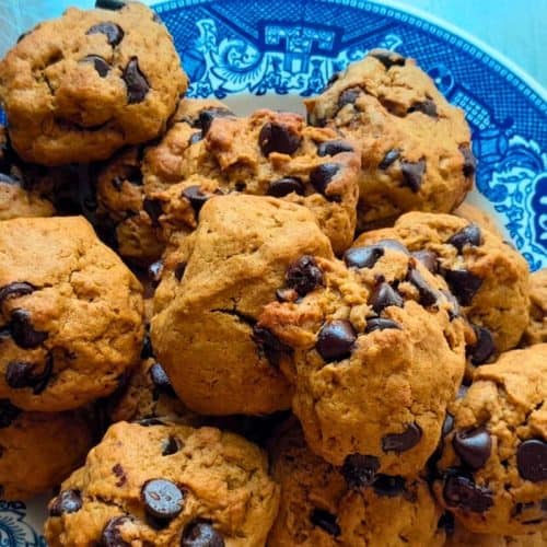 place sourdough discard chocolate chips cookies on a blue plate