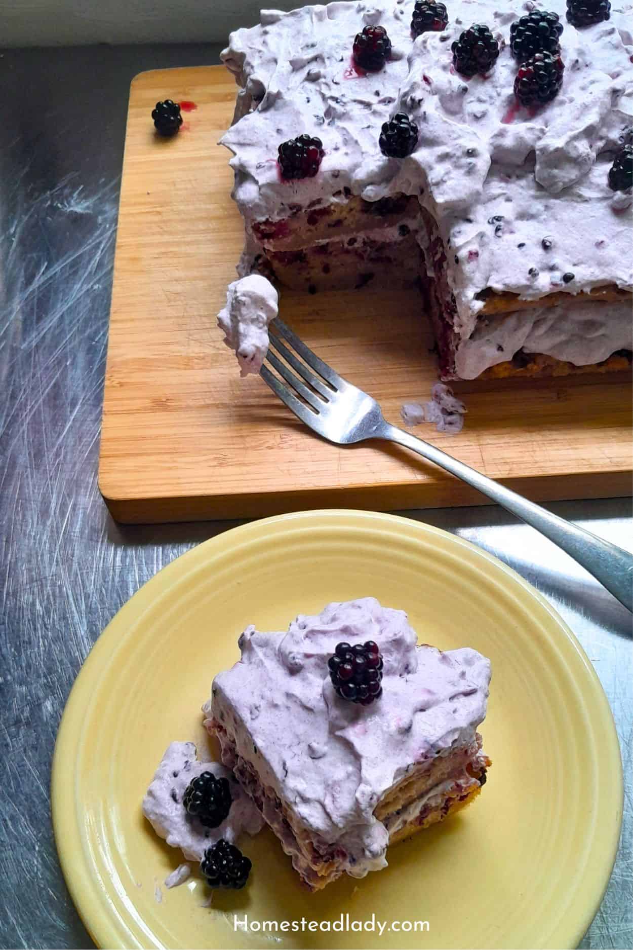 sourdough blackberry cake being served on a yellow plate