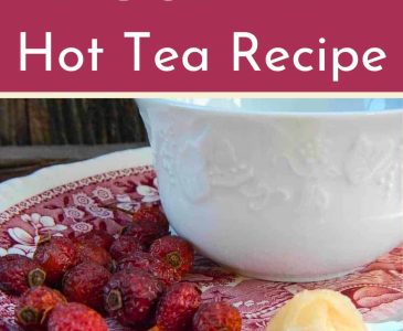 rose hips and honey on a plate with a cup of rosehip tea