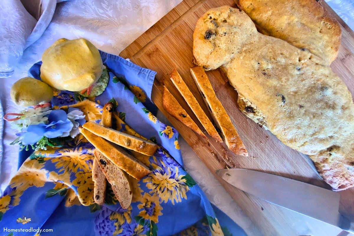 sourdough colomba Pasquale bread sitting on a cutting board ,sliced